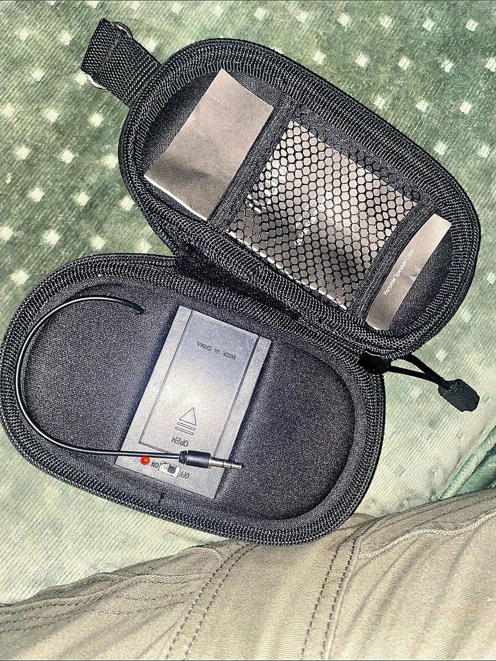 Portable speaker in carrying case in black